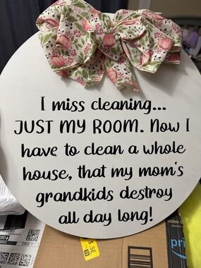 White Round Wall Sign with Pink Floral Bow - Humorous Cleaning Quote